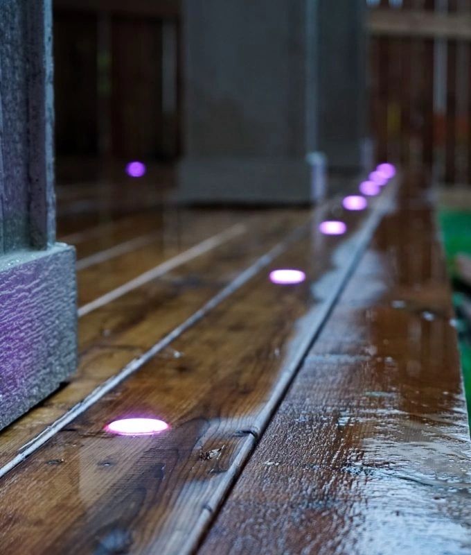 Outdoor living with installed outdoor lighting